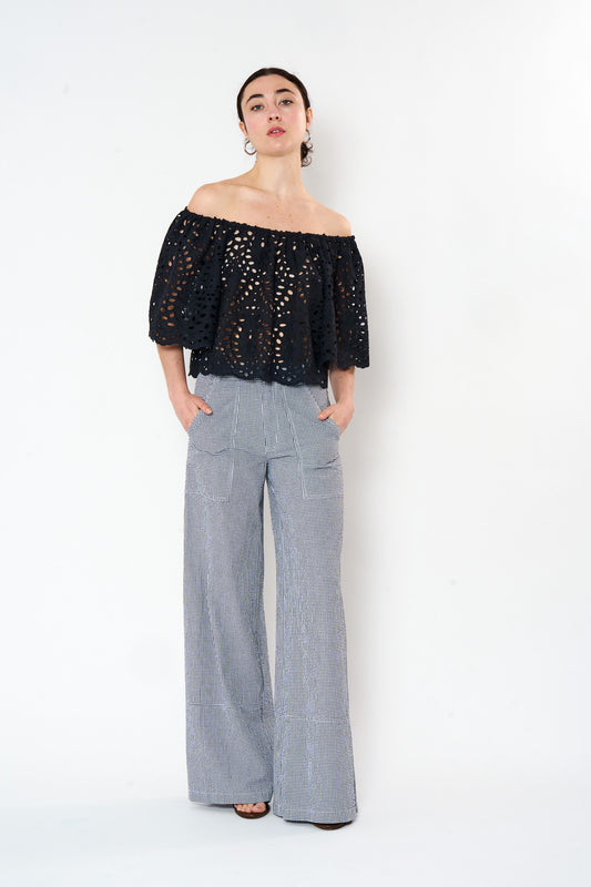 Black Eyelet Top shown on model, side view