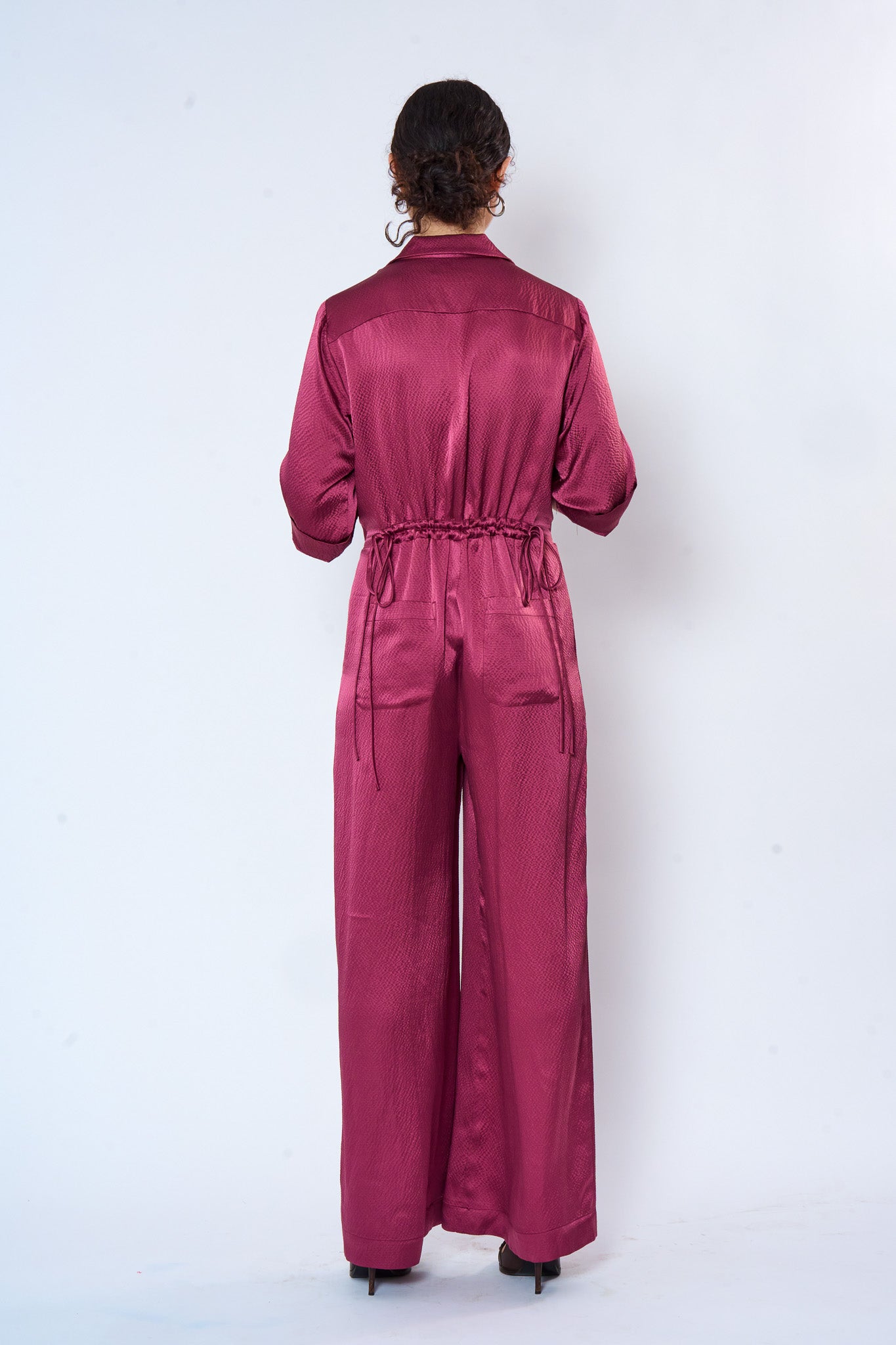 Vintage Rose Jumpsuit shown on model, close-up detail