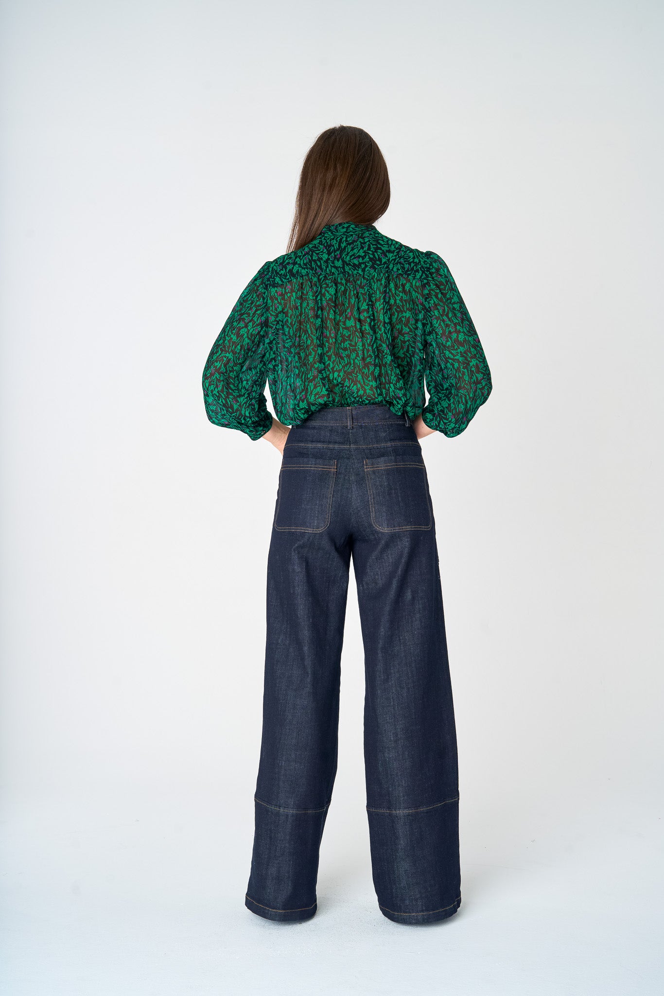 Dark denim Hepburn Trouser with contrast stitching and oversized exterior cargo pockets.