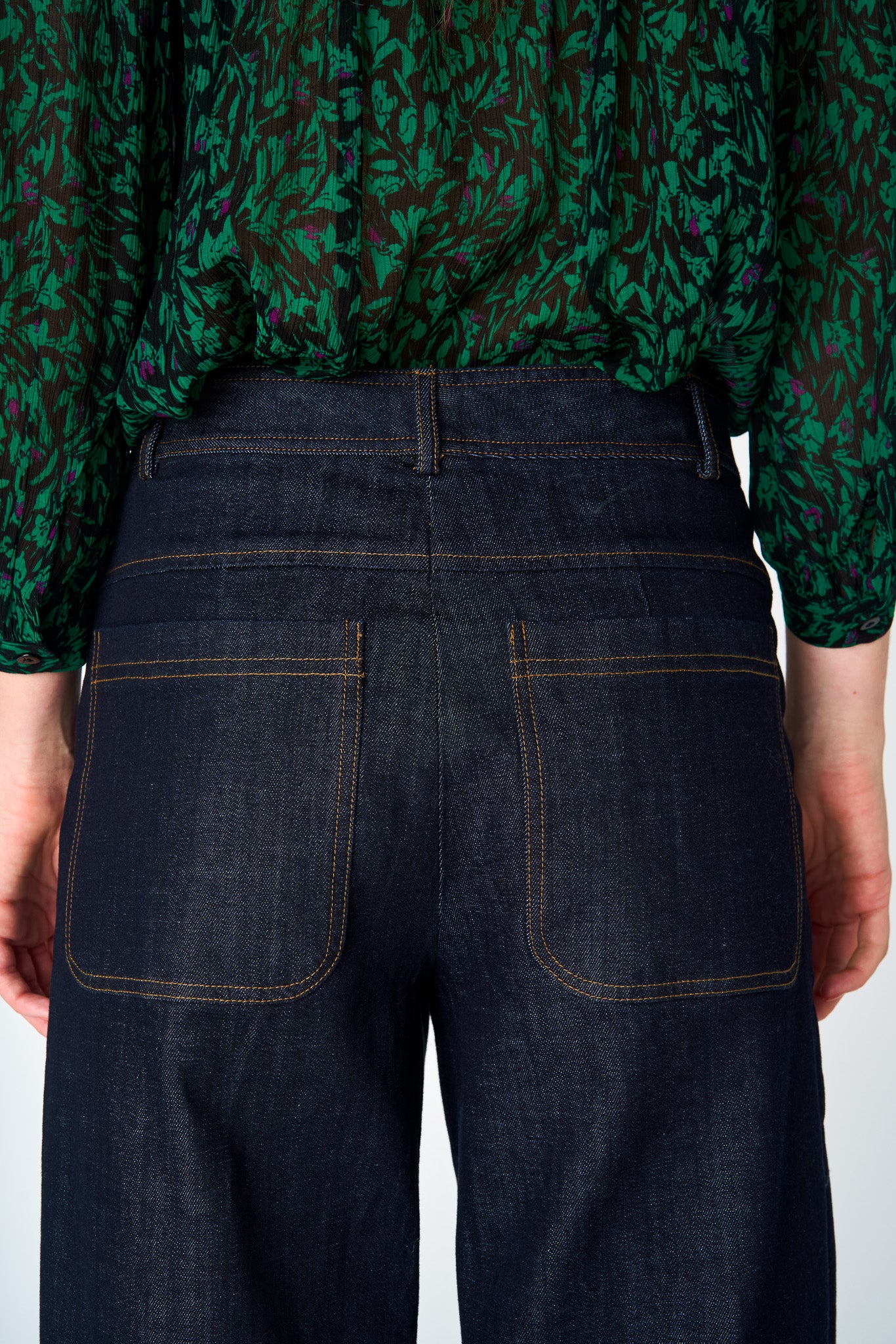 Large back pockets with contrast stitching on Hepburn Trousers.