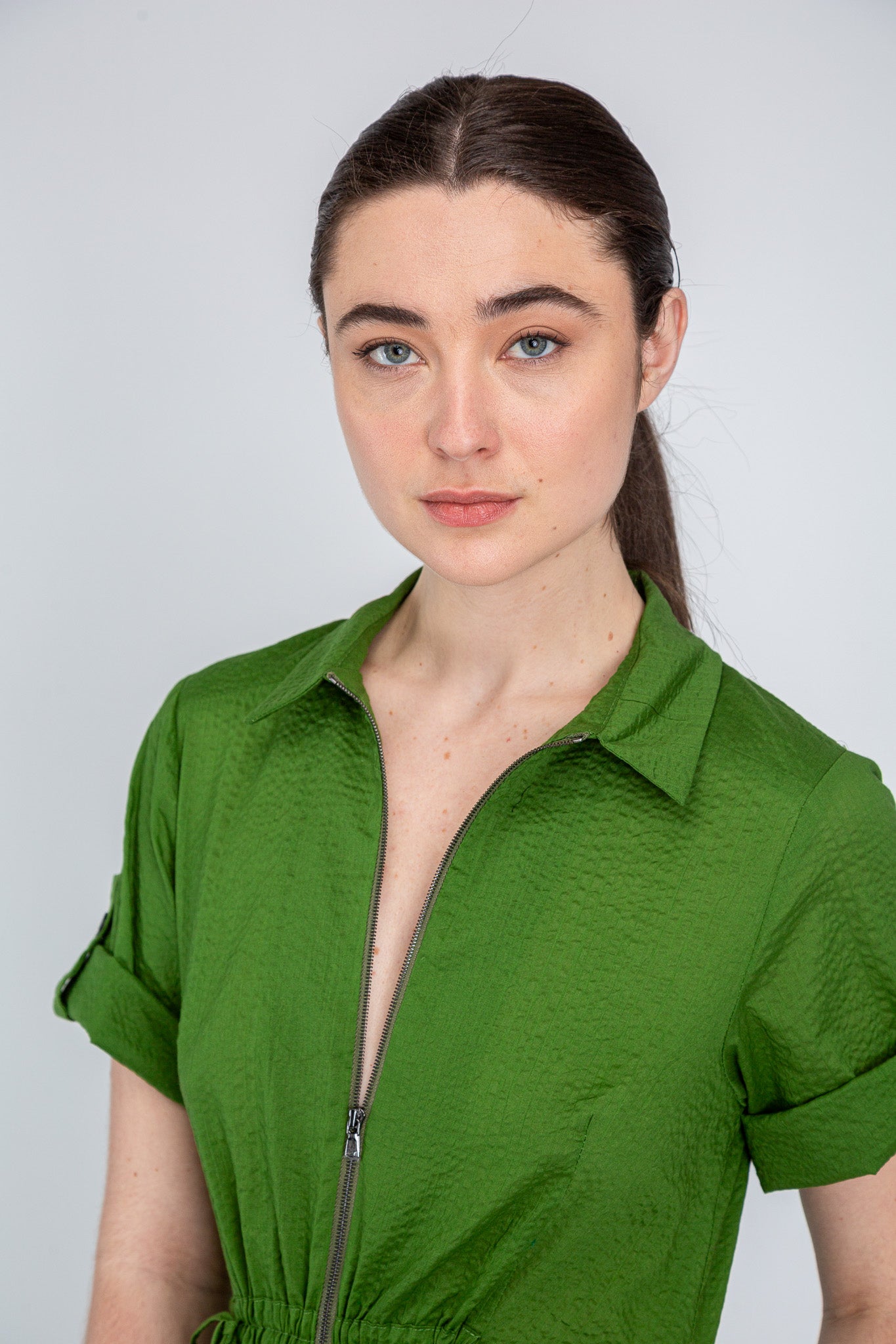 Olive Cotton Dame Dress shown on model, detail view