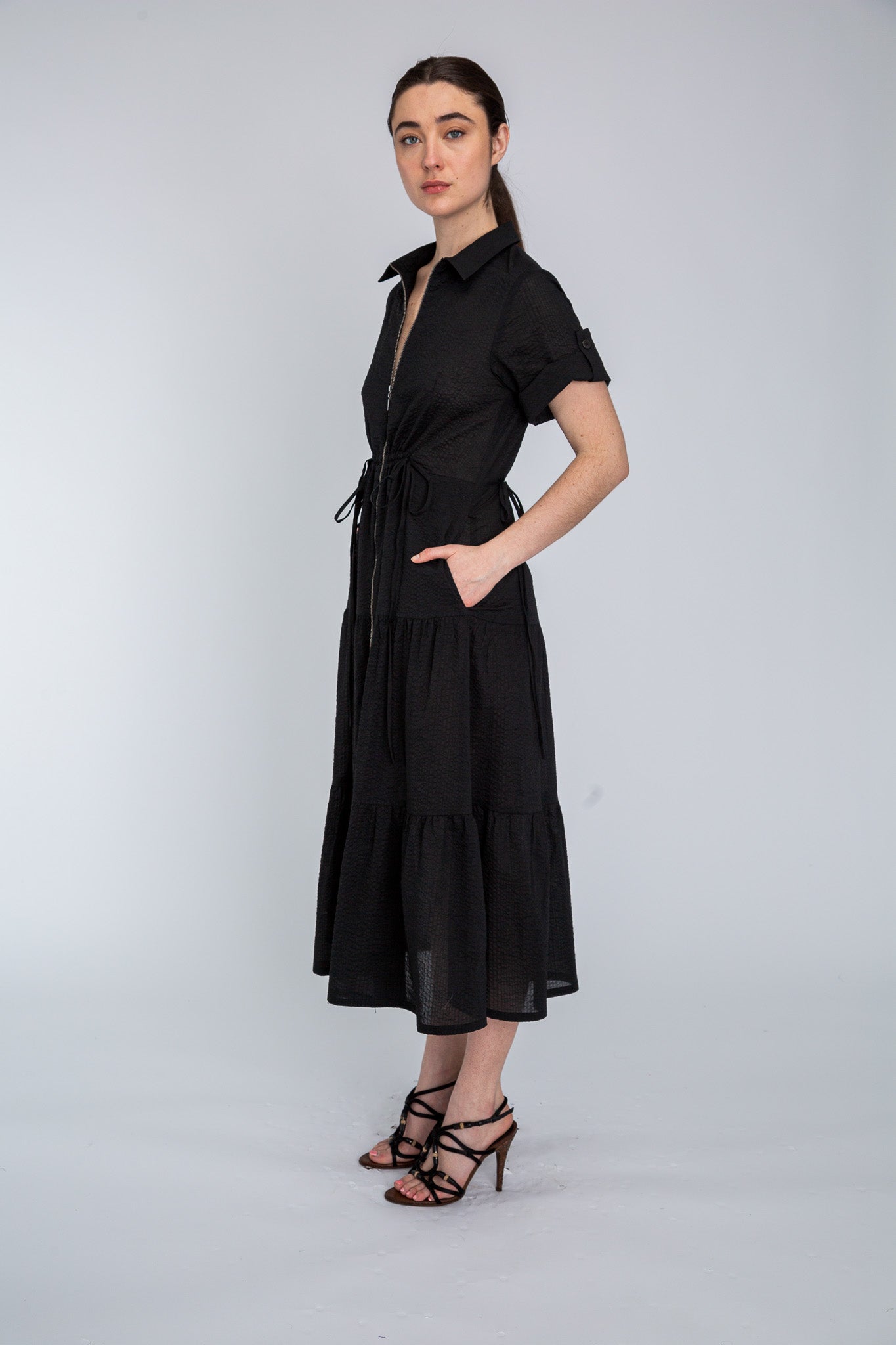 Cotton Dame Dress shown on model, detail view