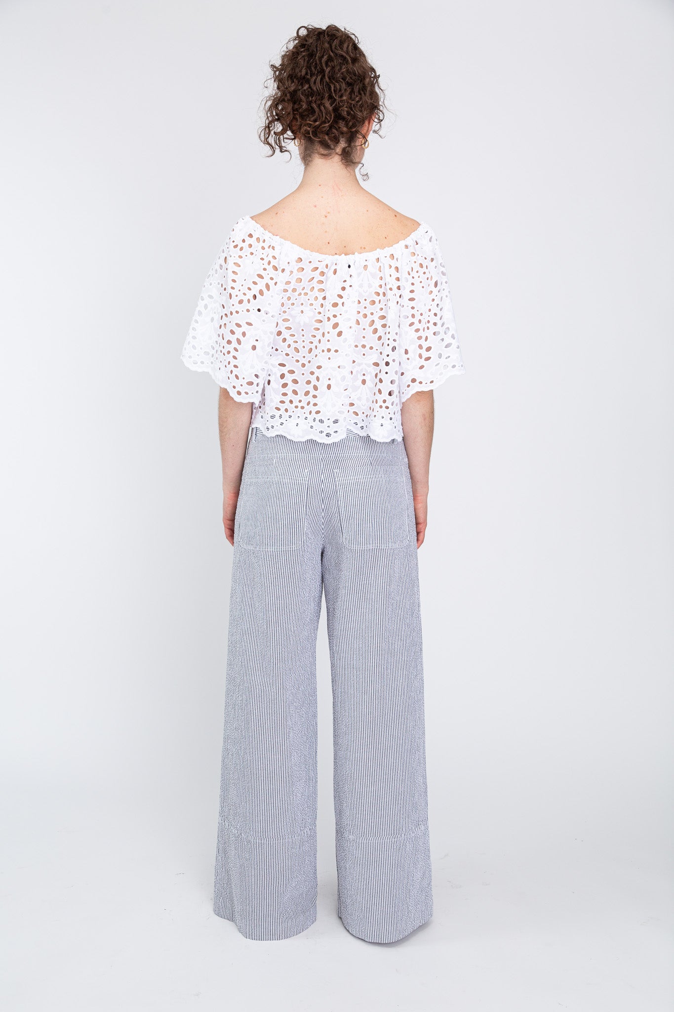 back view of eyelet top and pants