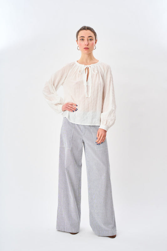 White Boho Tie Top shown on model, additional view