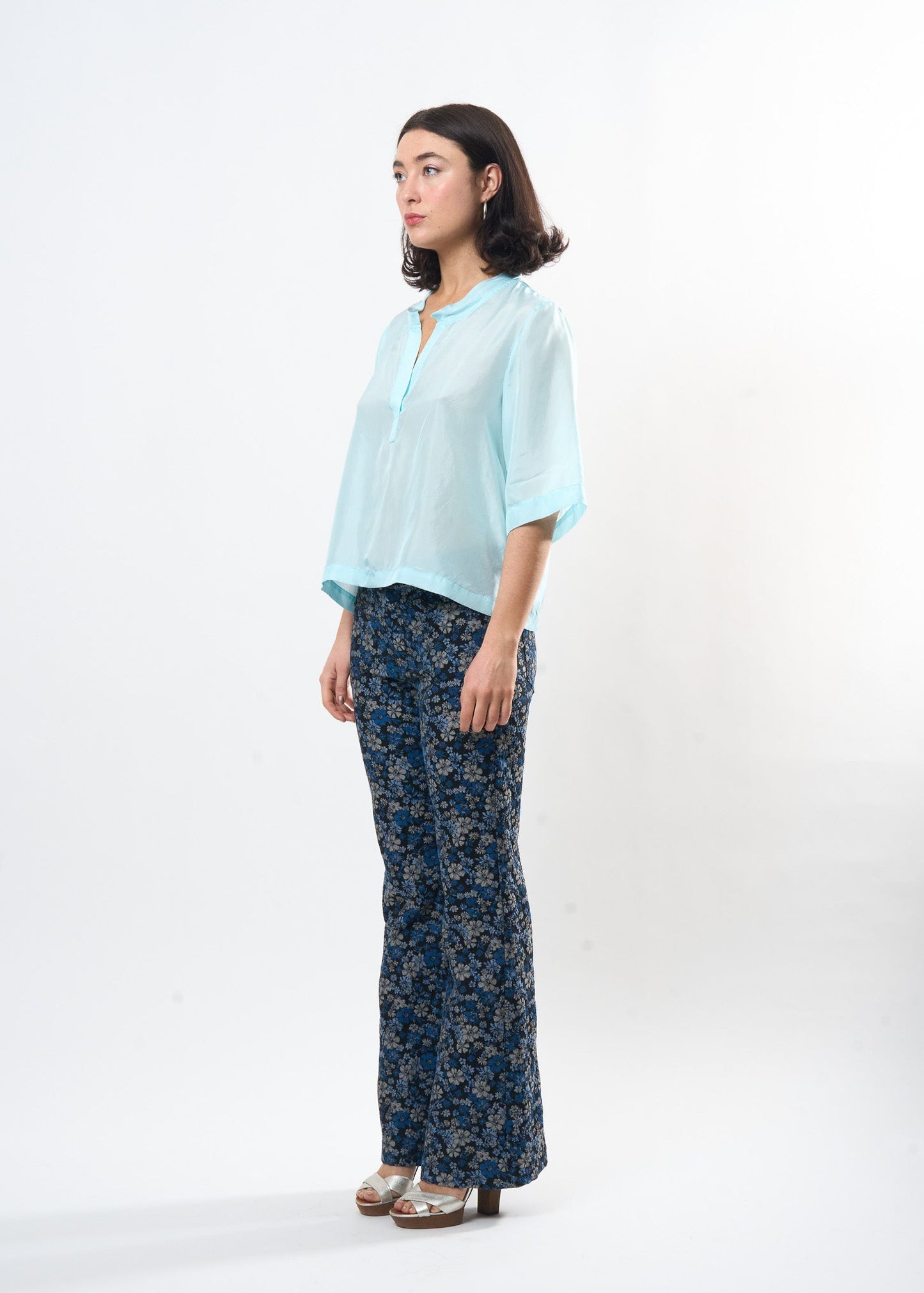Pale Blue Silk Tee shown on model, detail view