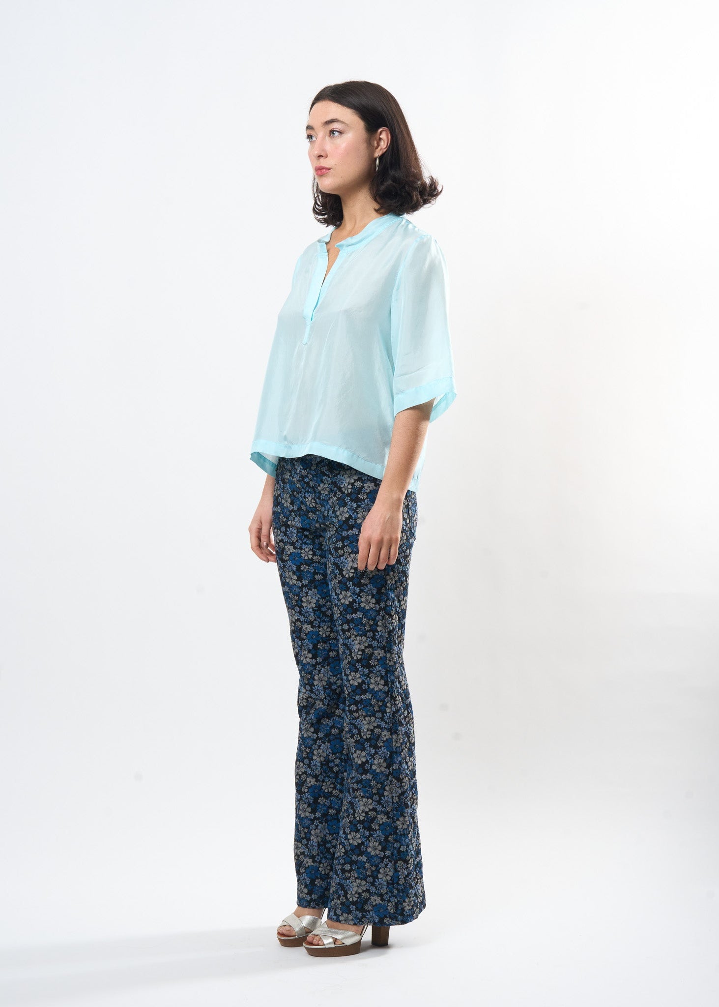 Pale Blue Silk Tee shown on model, detail view