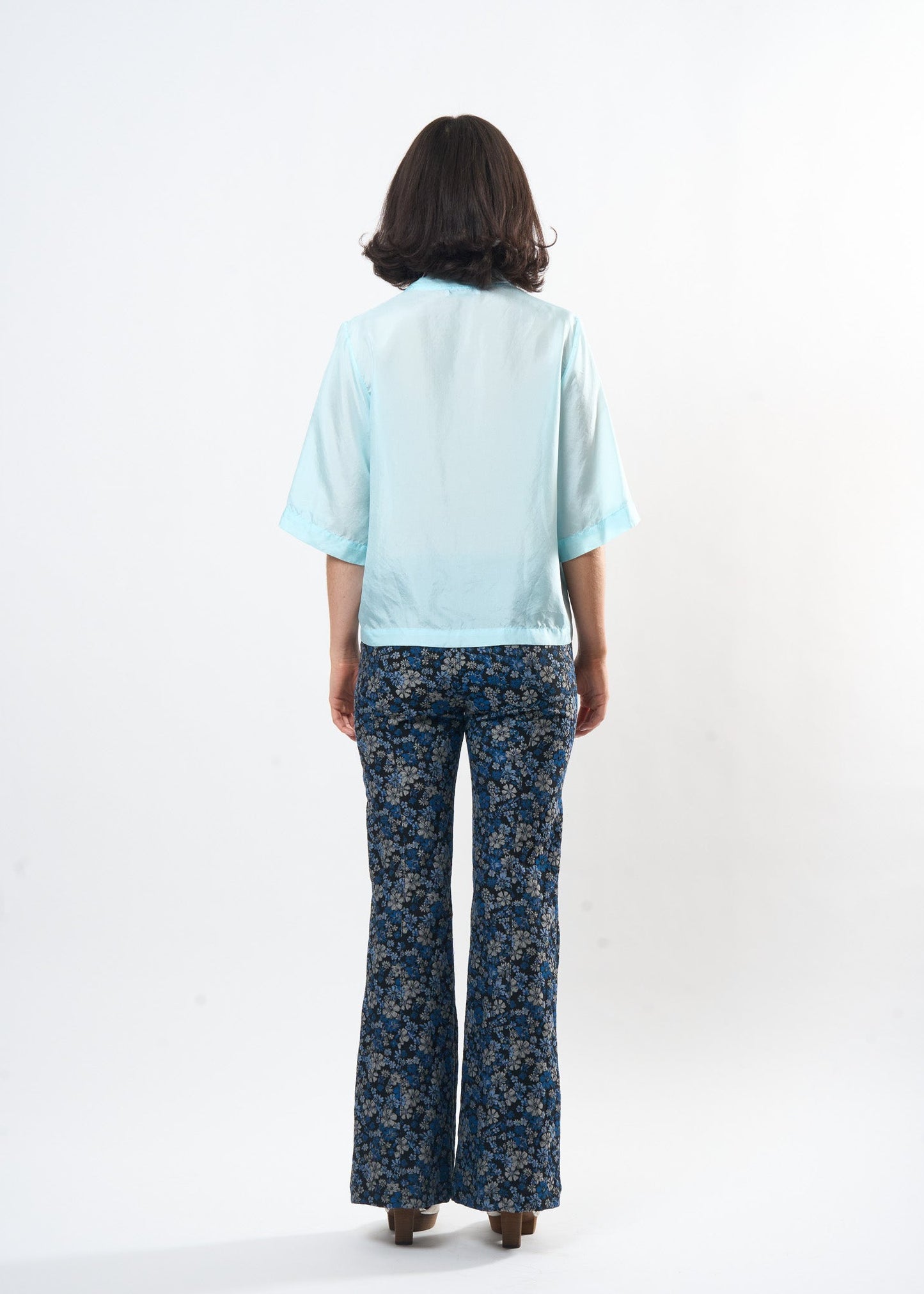 Pale Blue Silk Tee shown on model, alternate view