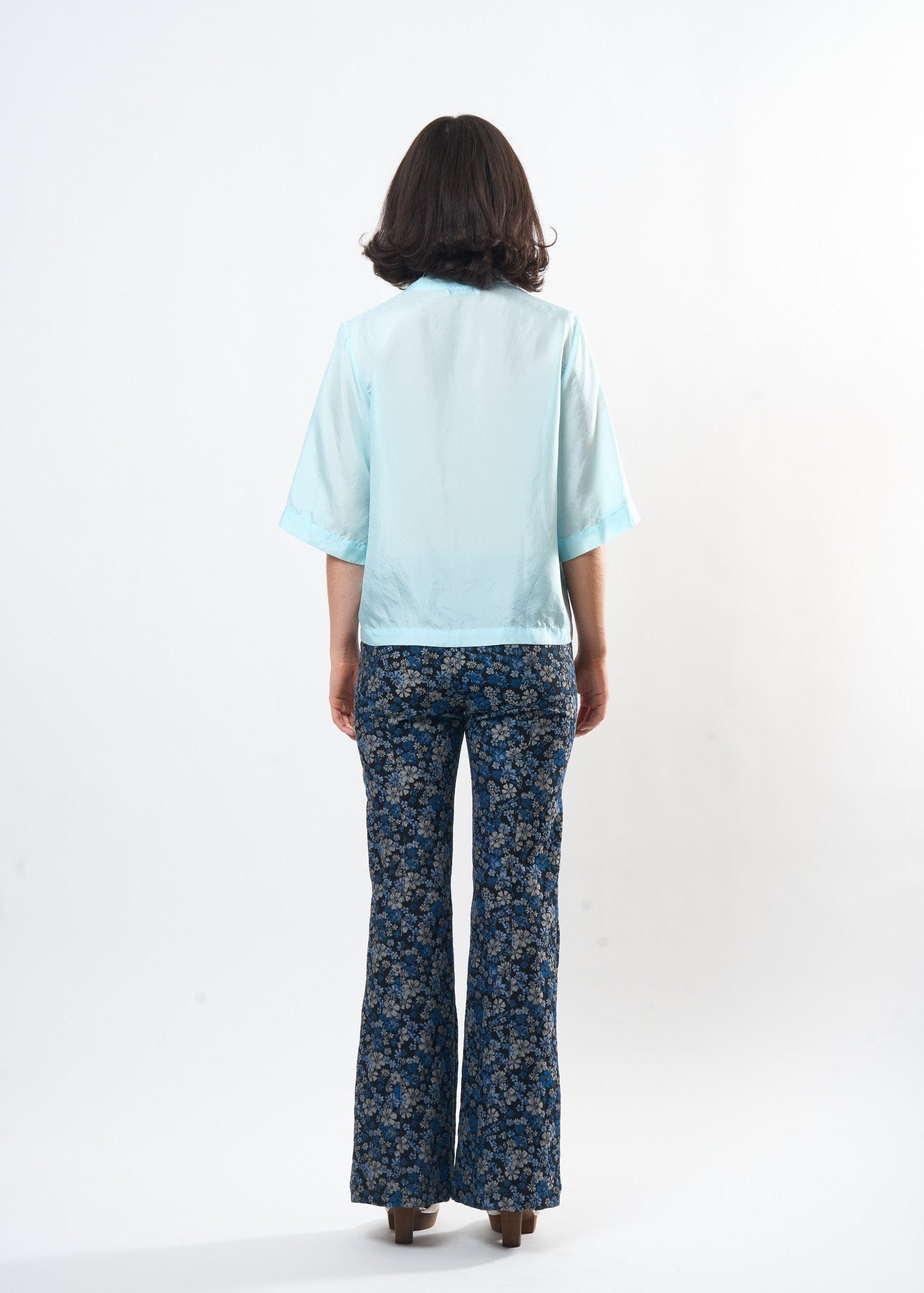 Pale Blue Silk Tee shown on model, alternate view