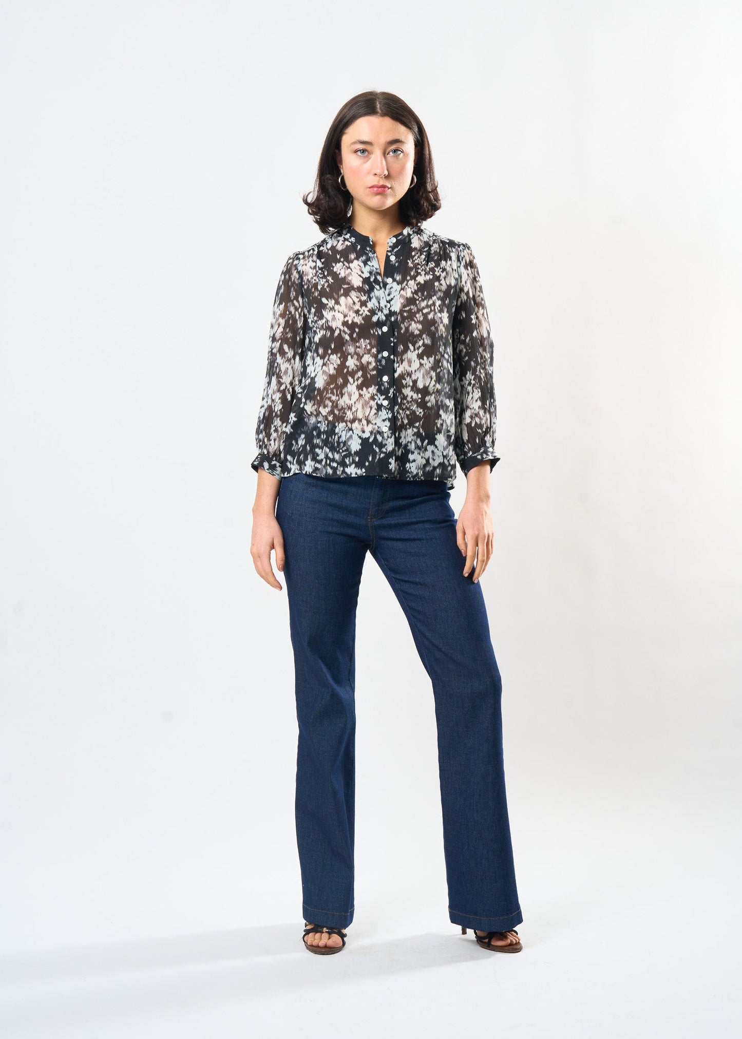 Woman wearing the Maria Cecilia Black & White Ikat Studio Top, front view