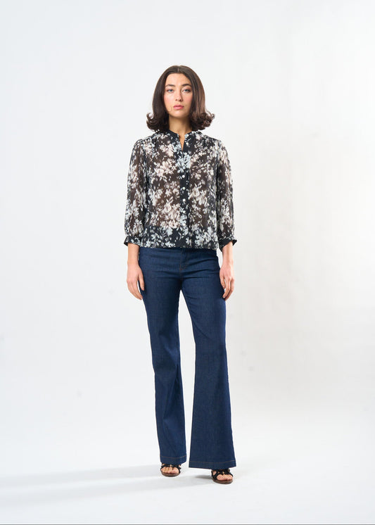 Black & White Ikat Studio Top shown on model, side view