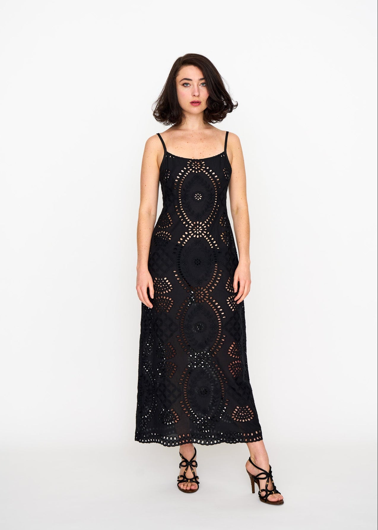 Black Eyelet Slip Dress shown on model, side view