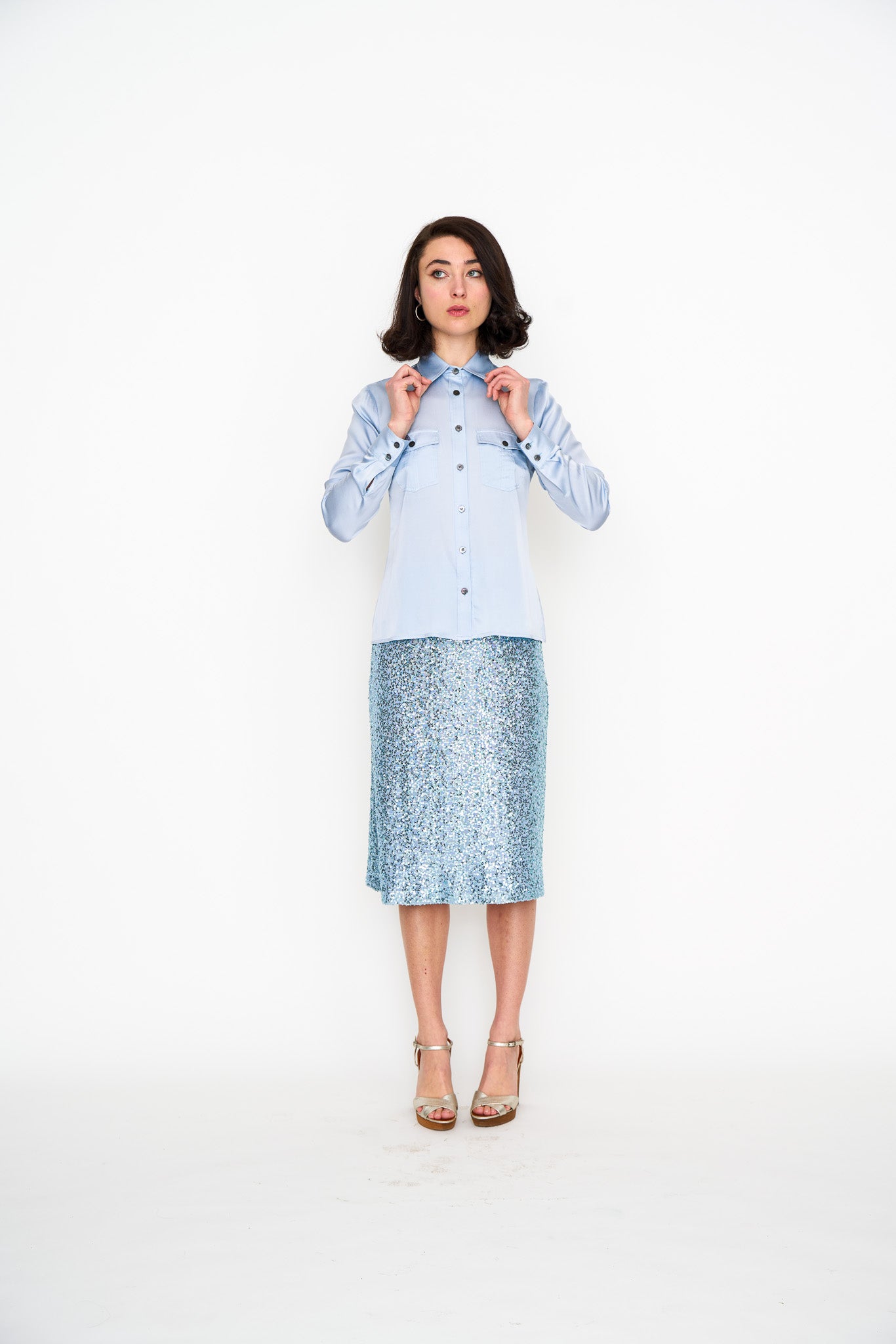 Woman wearing the Maria Cecilia Pale Blue Silk Utility Shirt, front view