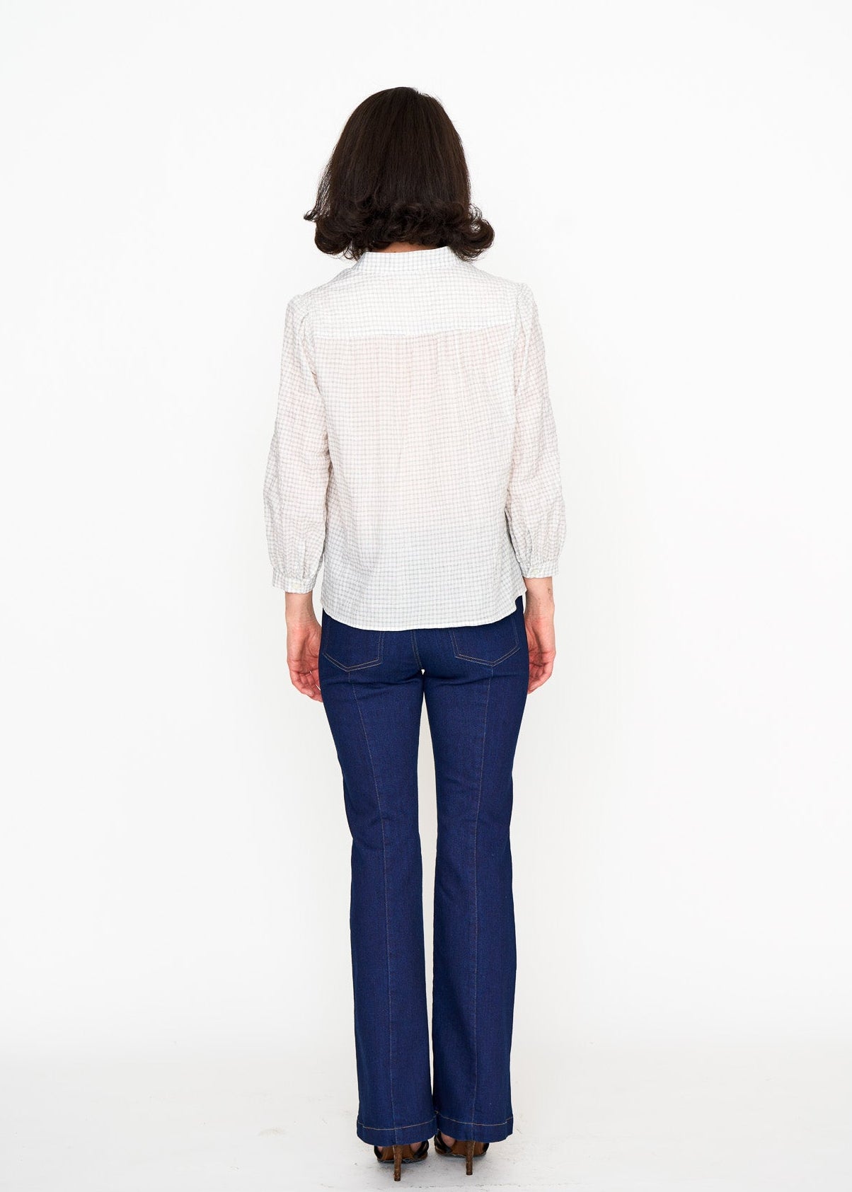 Mini Check Studio Top shown on model, detail view