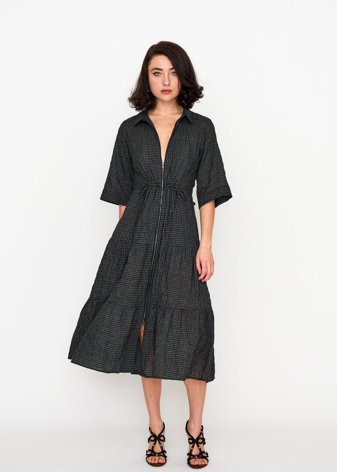 Woman wearing the Maria Cecilia Black Mini Check Dame Dress, front view