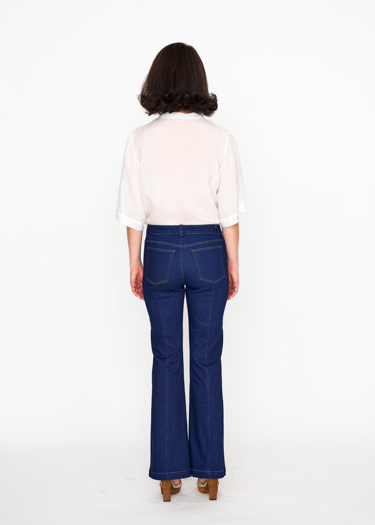 White Silk Tee shown on model, back view