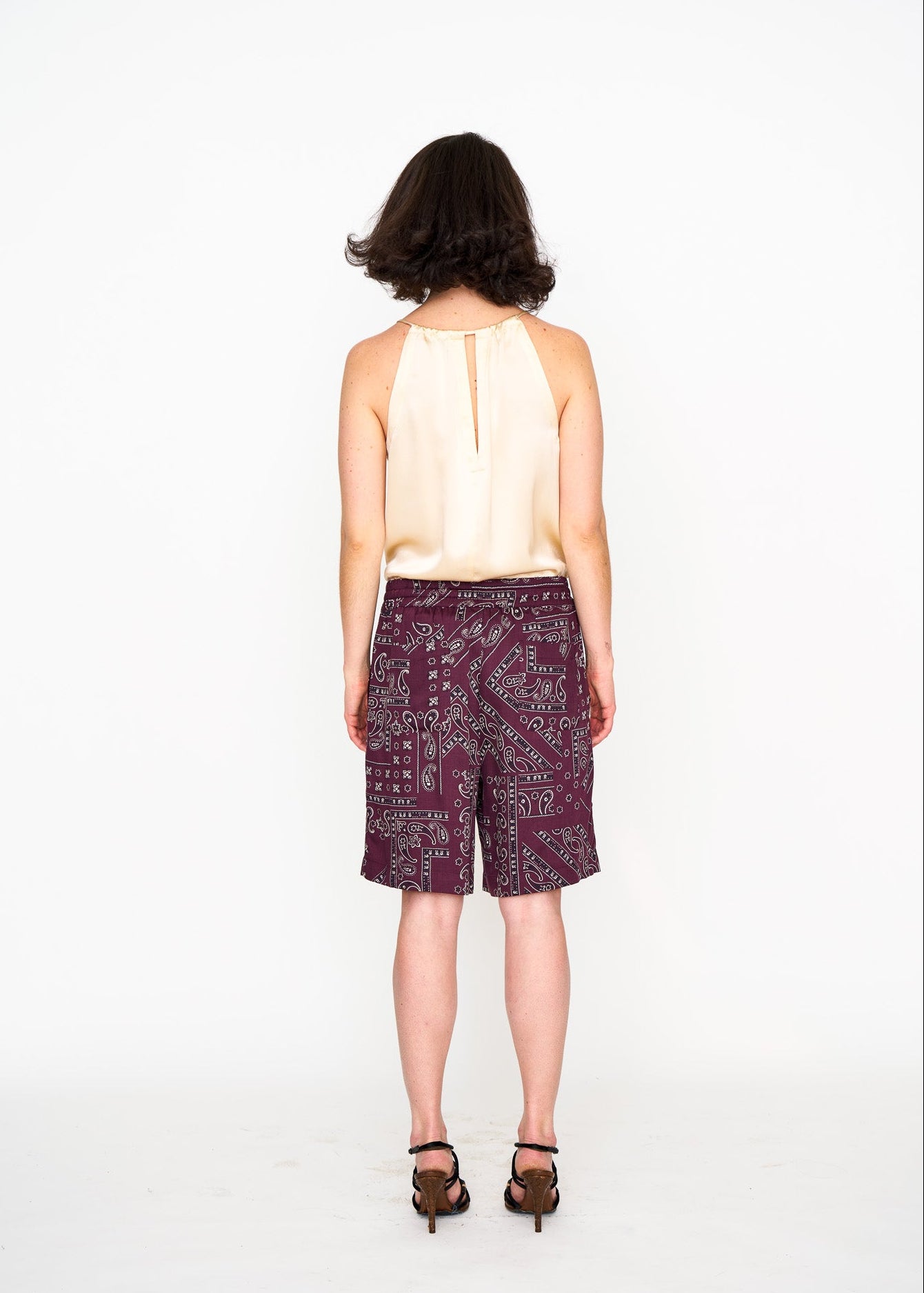 Ecru Satin Halter Top shown on model, detail view