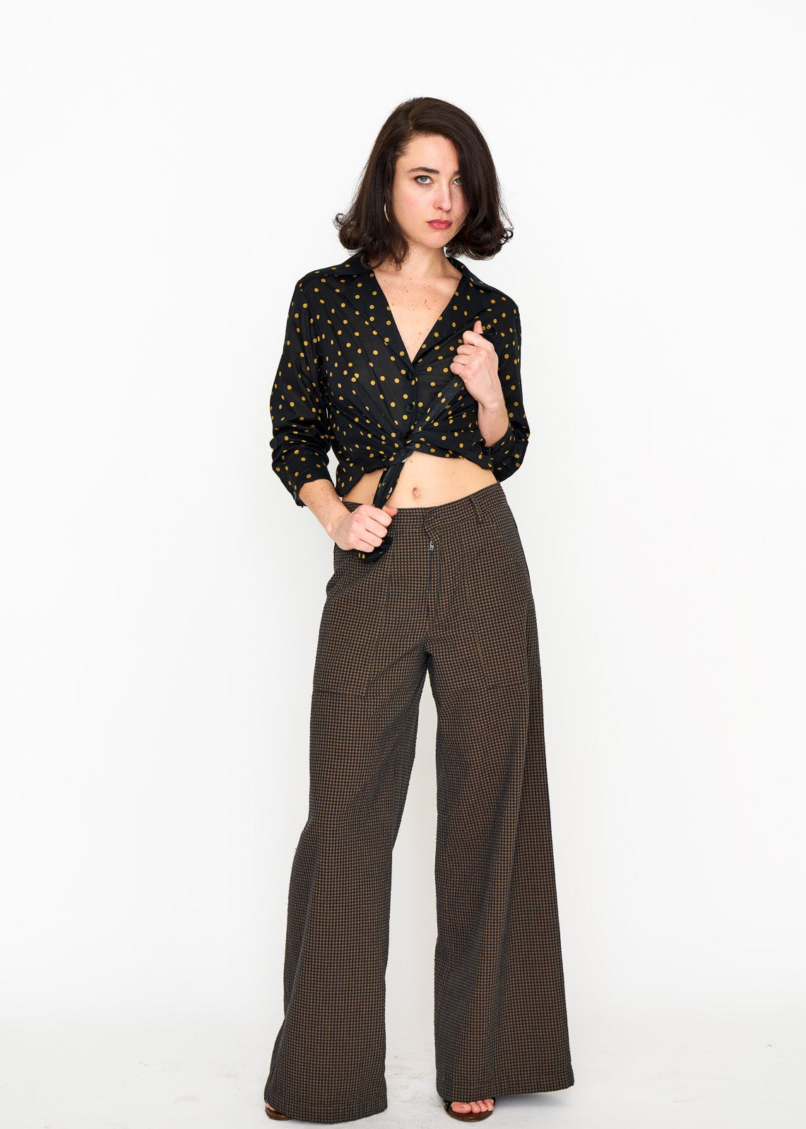 Woman wearing the Maria Cecilia Brown Mini Check Hepburn Trouser, front view