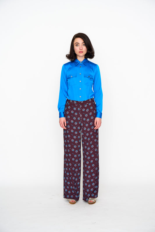 Woman wearing the Maria Cecilia Sangria & Acqua Feather Lounge Pant, front view