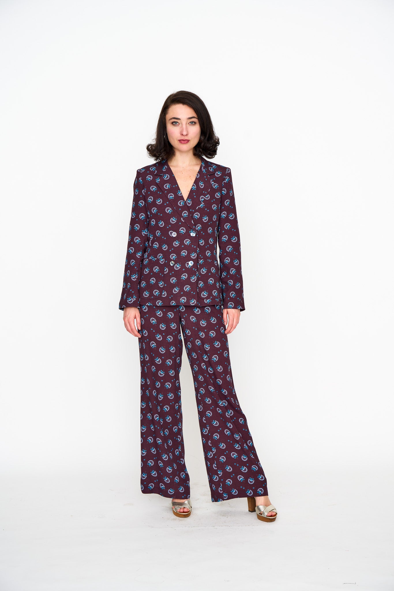 Woman wearing the Maria Cecilia Sangria Acqua Feather Lounge Blazer, front view