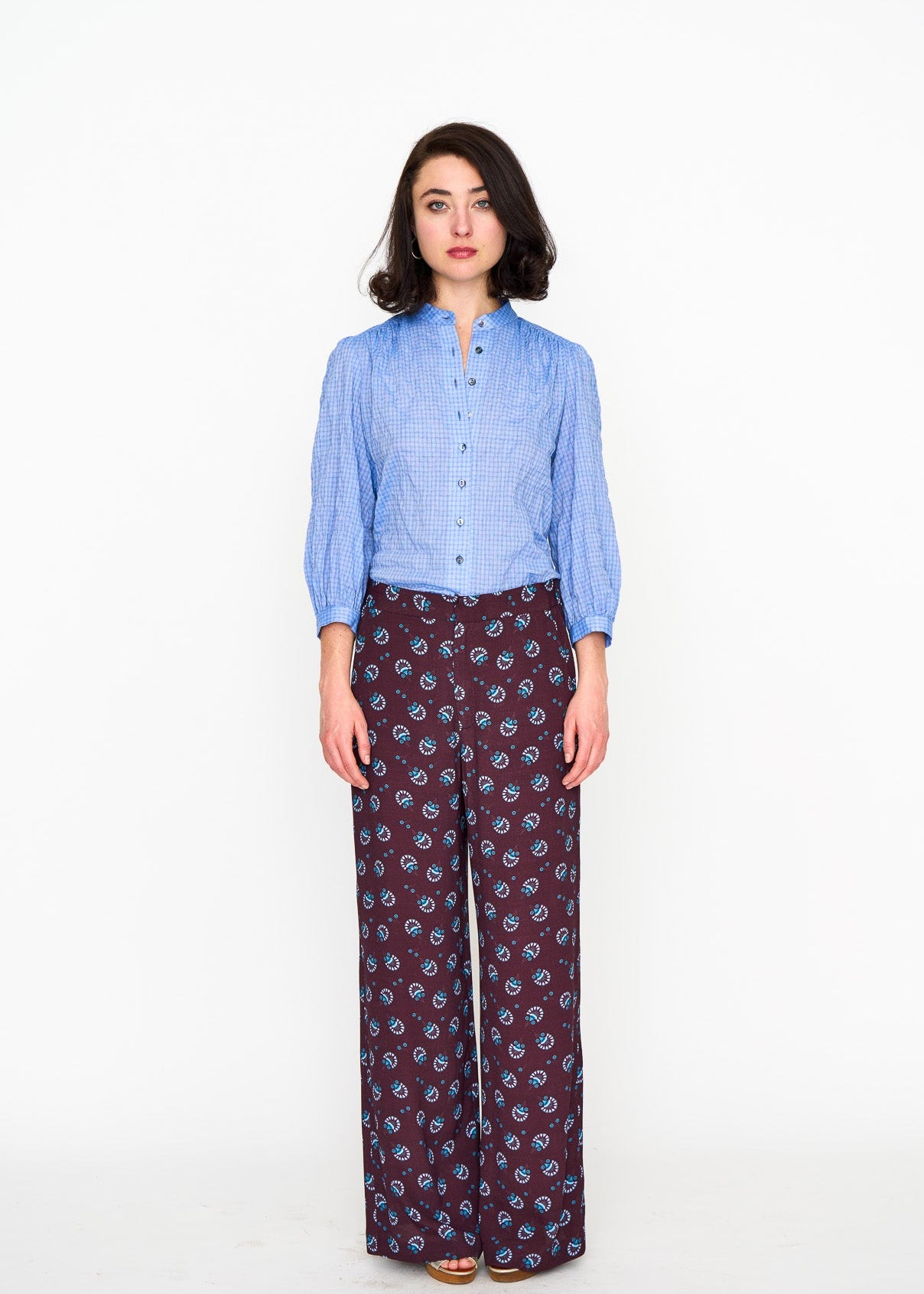 Chambray Studio Top shown on model, back view