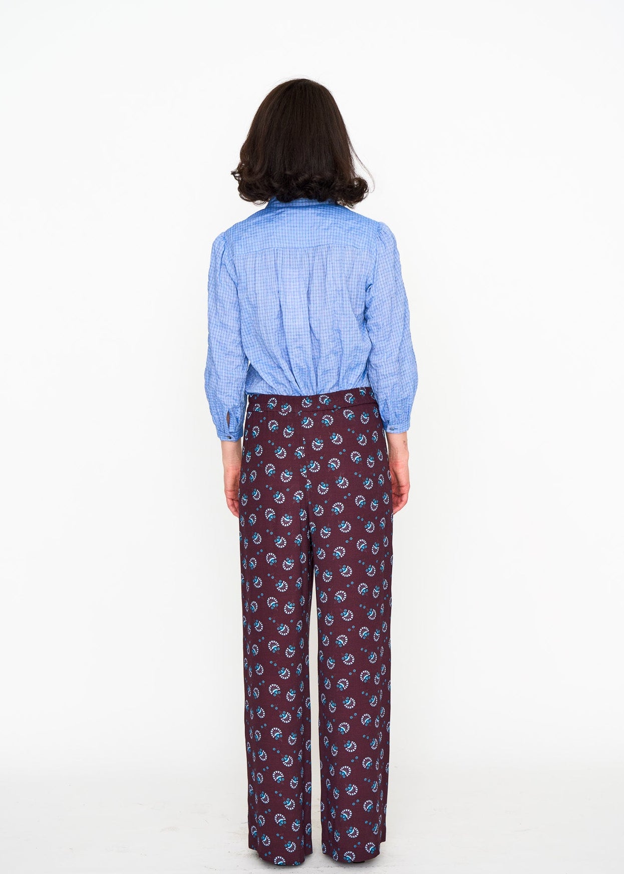 Chambray Studio Top shown on model, alternate view