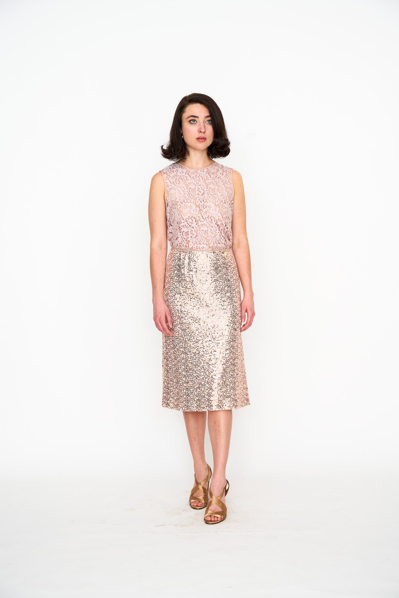 Rose Gold Sequin Slip Skirt shown on model, back view